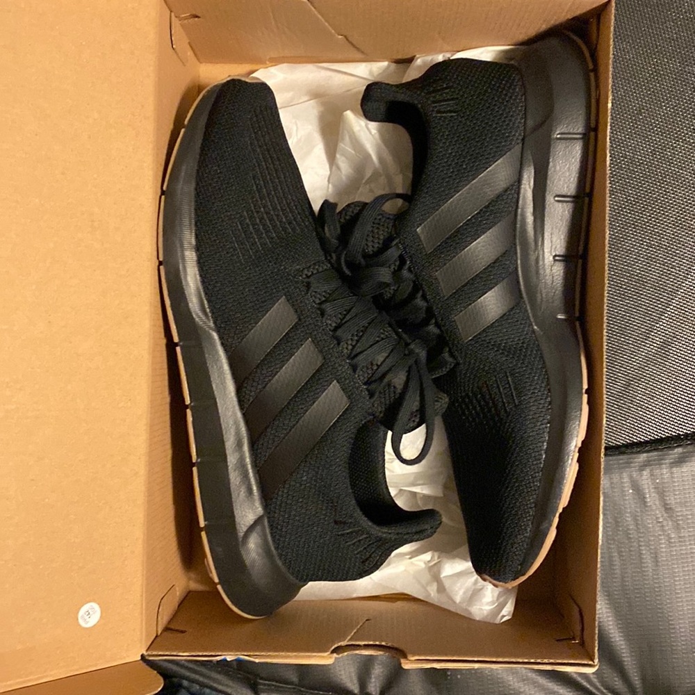 Adidas running shoes.